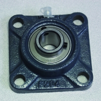 Palier complet auto-aligneur applique série UCF - Diamètre intérieur : 30 mm - Référence du roulement insert : UC206 - Largeur bague intérieure : 19 mm - Entraxe de fixation : 83 mm